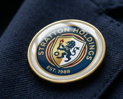 A premium custom resin-domed personalised badges with a 3D raised glossy finish on a corporate suit jacket, manufactured by Dash Dynamics.